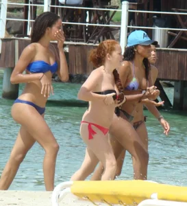 Amazing ebony ass in blue bikini with other sexy friends in bikinis
