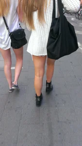 Street girlfriends in short dresses