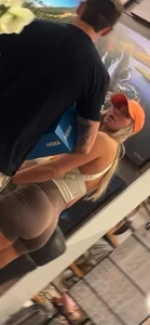 Blondie shopping with bf in her tight shorts