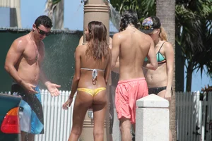 Great tanned ass in yellow thong bikini