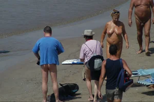 Girls on a nude beach in Sitges, Spain