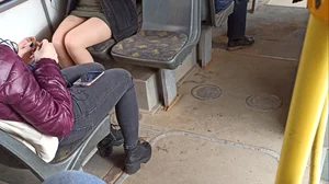 Nice Legs in Pantyhose and a Skirt in a Public Bus