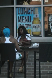 Sexy ebony Tilted Kilt employee in her uniform