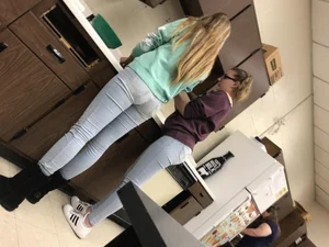 Girls in Light Blue Tight Jeans in a Kitchen