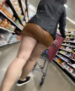 Ass hanging out of leather mini skirt
