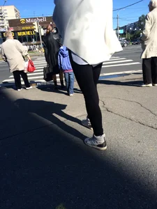 Blonde Girl With Fit Muscular Legs in Tight Black Jeans and Sneakers on a Crosswalk  - Street Creepshots Collection