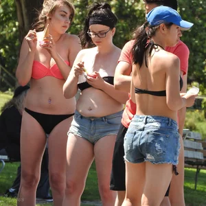 Group of sexy girls in bikinis at the beach