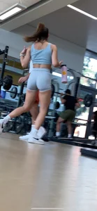 College gym slut in grey spandex shorts