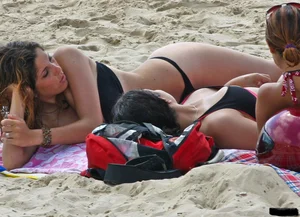 Beach voyeur babes in bikinis, thongs and topless