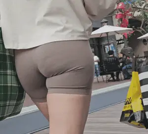 Booty in light brown biker shorts