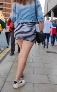 Redhead squeezed into a tight dress