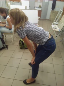 Cute College Art Student in Tight Jeans And Flats Bend Over