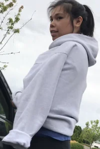 Cute girl in leggings getting into the car street photos