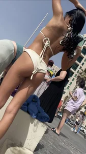 Skinny girl in a swimsuit at the beach