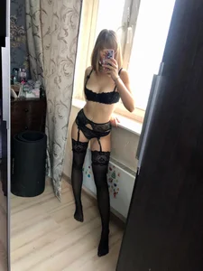 Hot Slender Girl in Black Lingerie and Stockings Home Mirror Selfie