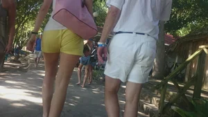 Milf in yellow shorts with vpl and a wedgie