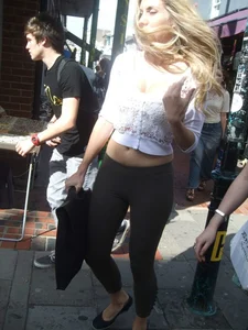 Sexy blonde out walking in green leggings with vpl