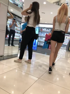 Blonde in Mini Shorts with Hot Legs Store Creepshots