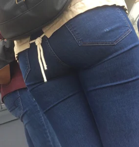 2 nice asses in tight jeans standing around