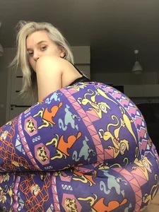 Blonde in a Bra and Colorful Yoga Pants Hot Ass Selfie Closeups on the Floor