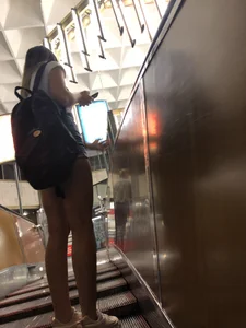 Girl in Mini Shorts with Awesome Legs on the Subway Escalator Creepshots