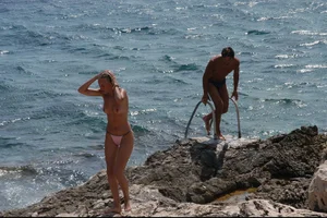 Nude girls on a beach in Hvar, Croatia
