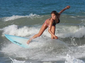 Hot surfer chicks out in the water