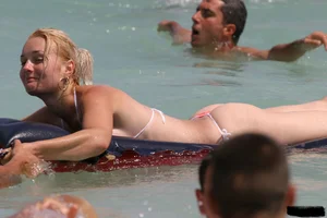 Beach voyeur girls in bikinis, thongs and topless