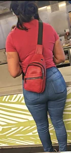 Thick ebony booty in tight jeans.