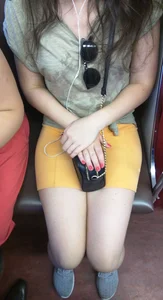 Very Cute Girl in Shorts Sitting in a Subway Train Creepshots Gallery