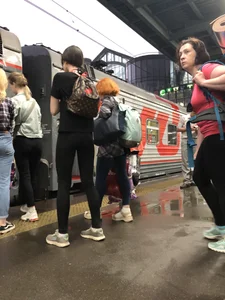 Teen Girl in Tights And Sneakers Standing on the Train Platform VPL Photos