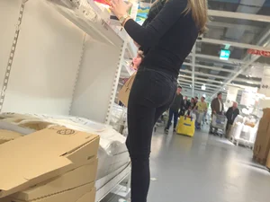 Skinny girl shopping in tight black jeans