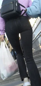 Juicy ass in black tight jeans and nice skinny legs street closeups