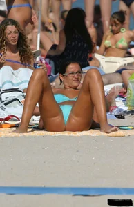 Beach voyeur babes in bikinis, thongs and topless