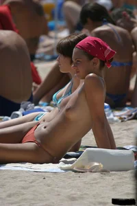Beach voyeur babes in bikinis, thongs and topless
