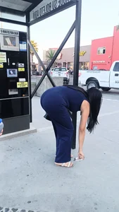 Bending in black yoga shorts