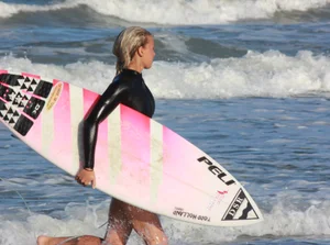 Hot surfer chicks out in the water