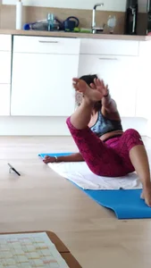 Sexy girlfriend doing yoga at home in leggings