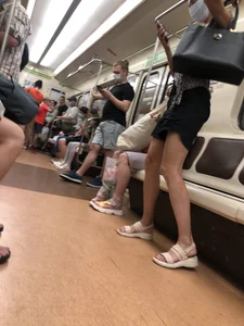 Candid Girl With Hot Long Legs in Shorts And Sandals Subway Train Creepshots Gallery
