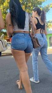 super sexy denim short shorts on this brunette with tremendous legs and big butt