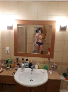 A Skinny Topless Girl in Panties Bathroom Mirror Selfie