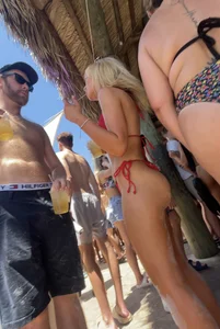 Blonde with crazy jiggly bubble in red bikini