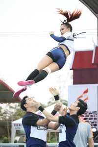 Bunch of athletic Thai cheerleaders at a competition
