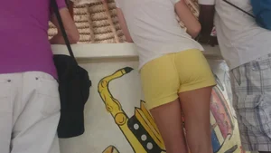 Milf in yellow shorts with vpl and a wedgie