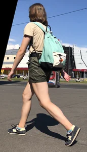 Cute Dorky Girl in Shorts with Thin Muscular Legs Street Candid Photos
