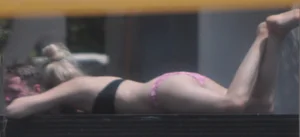 Resort Tan in pink bikini