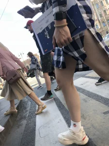 Nice legs of a candid girl crossing the street