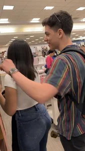 Pretty babe in tight jeans showing nipples in book store w bf (Not OC)(Face shot)