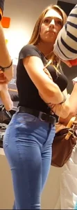 Excelent woman in blue tight jeans