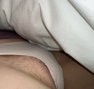 Awesome collection of sneaky pics under the blanket, closeup of a girl's hairy pussy in different panties
